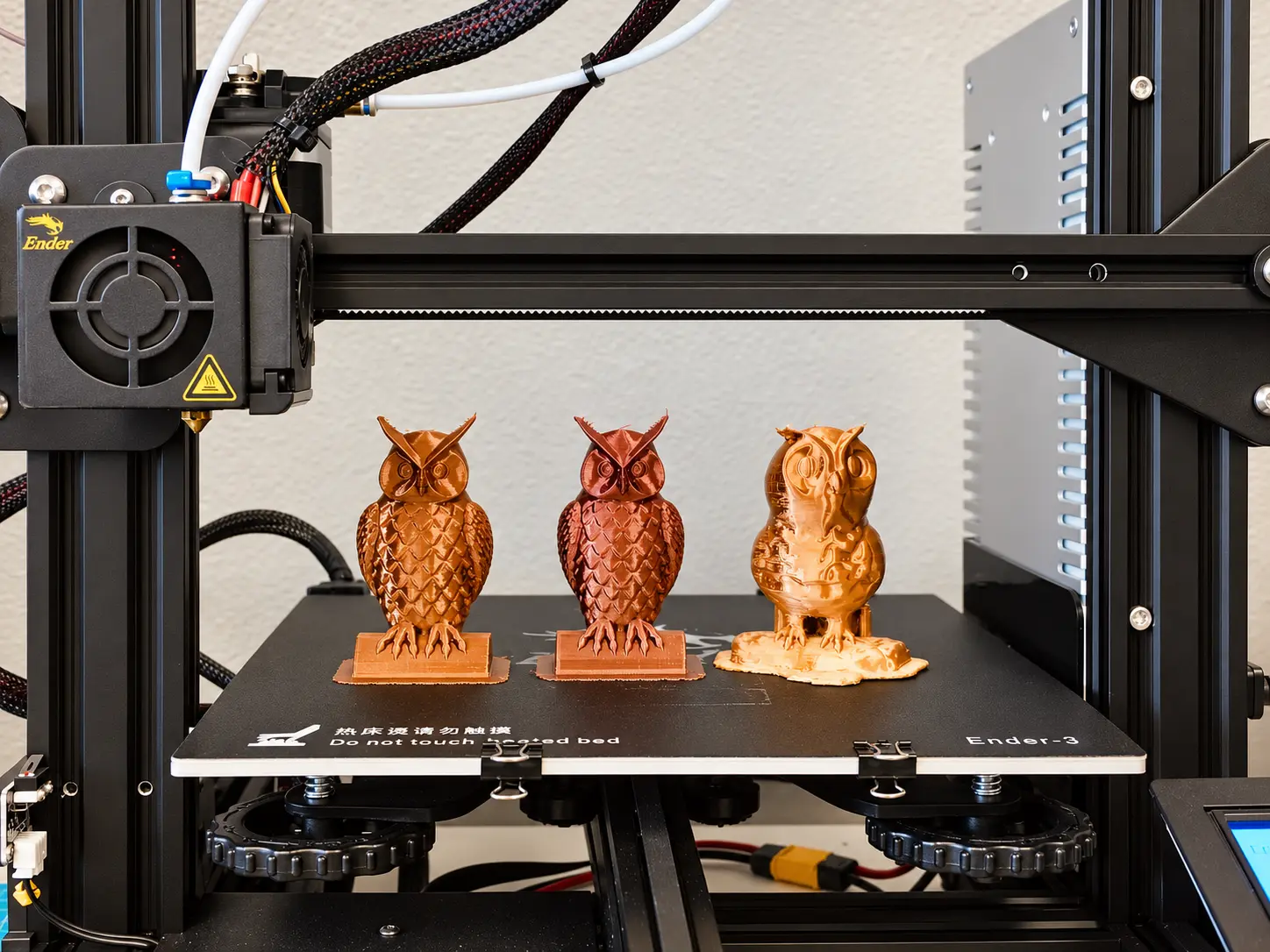 Three owl models showing the results of a 3D-printing project