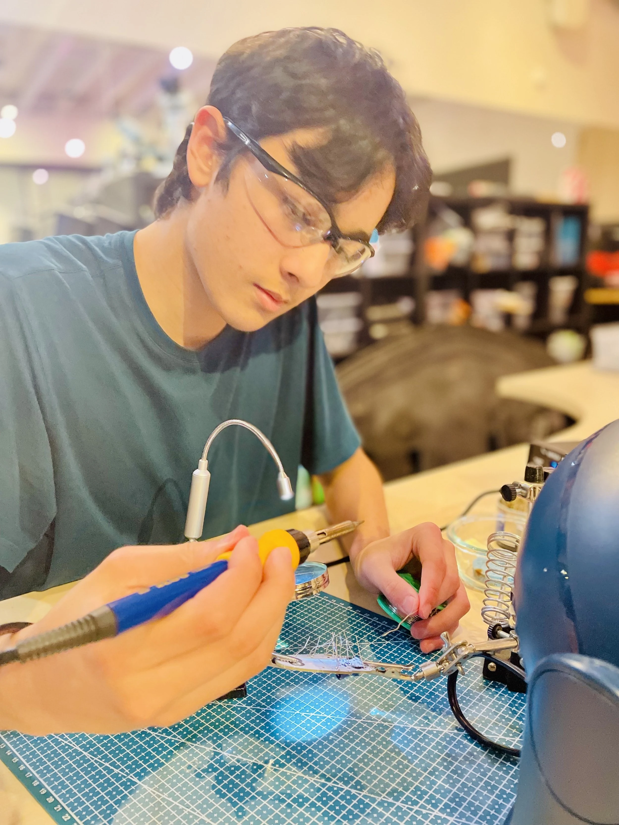 A student assembling a hands-on project.