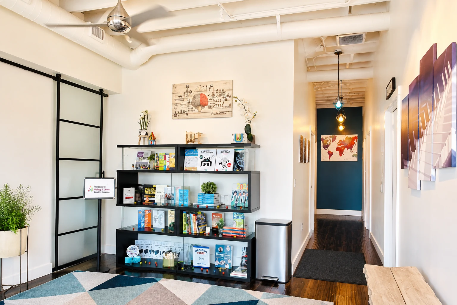 A bright learning space with books and work tables.