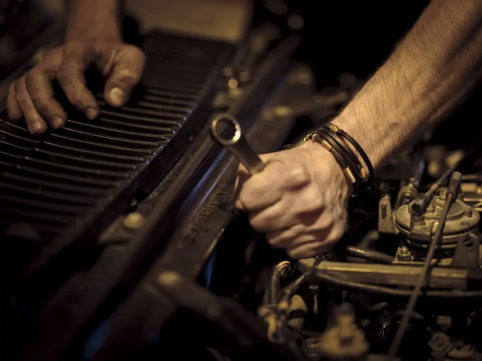 Albertos Polishing · Technician working with a radiator in an engine bay — illustrative stock photograph 4