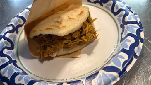 Venezuelan Bakery & Cafe · a filled arepa